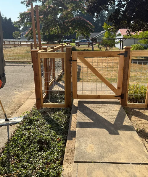 540ft Hug wire fence galvanized on cedar fence with 3 gates in Buckley 